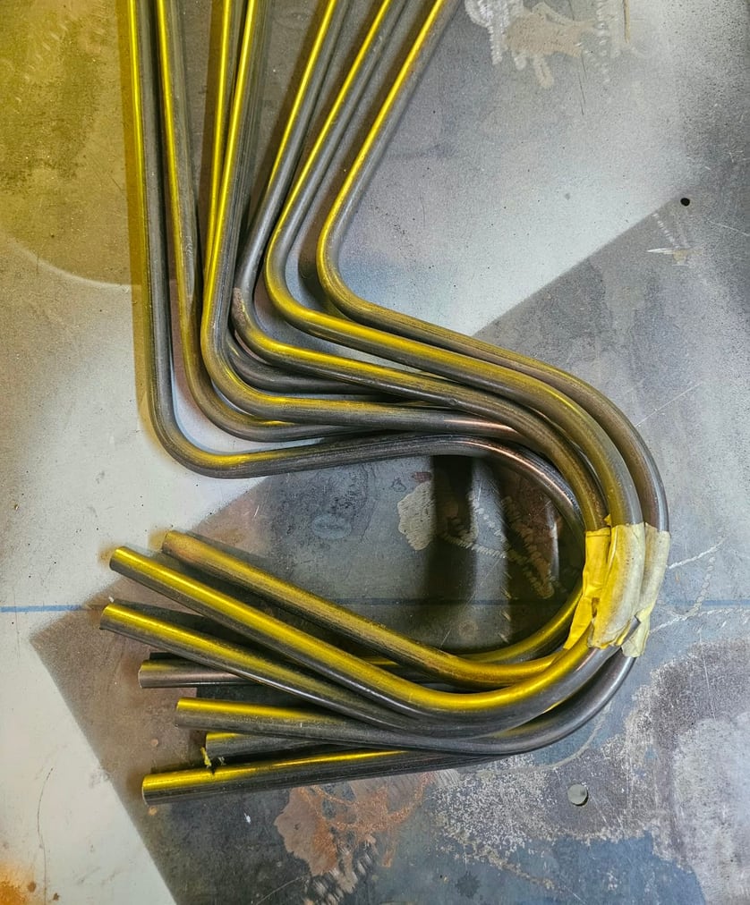 Bent brass tube
