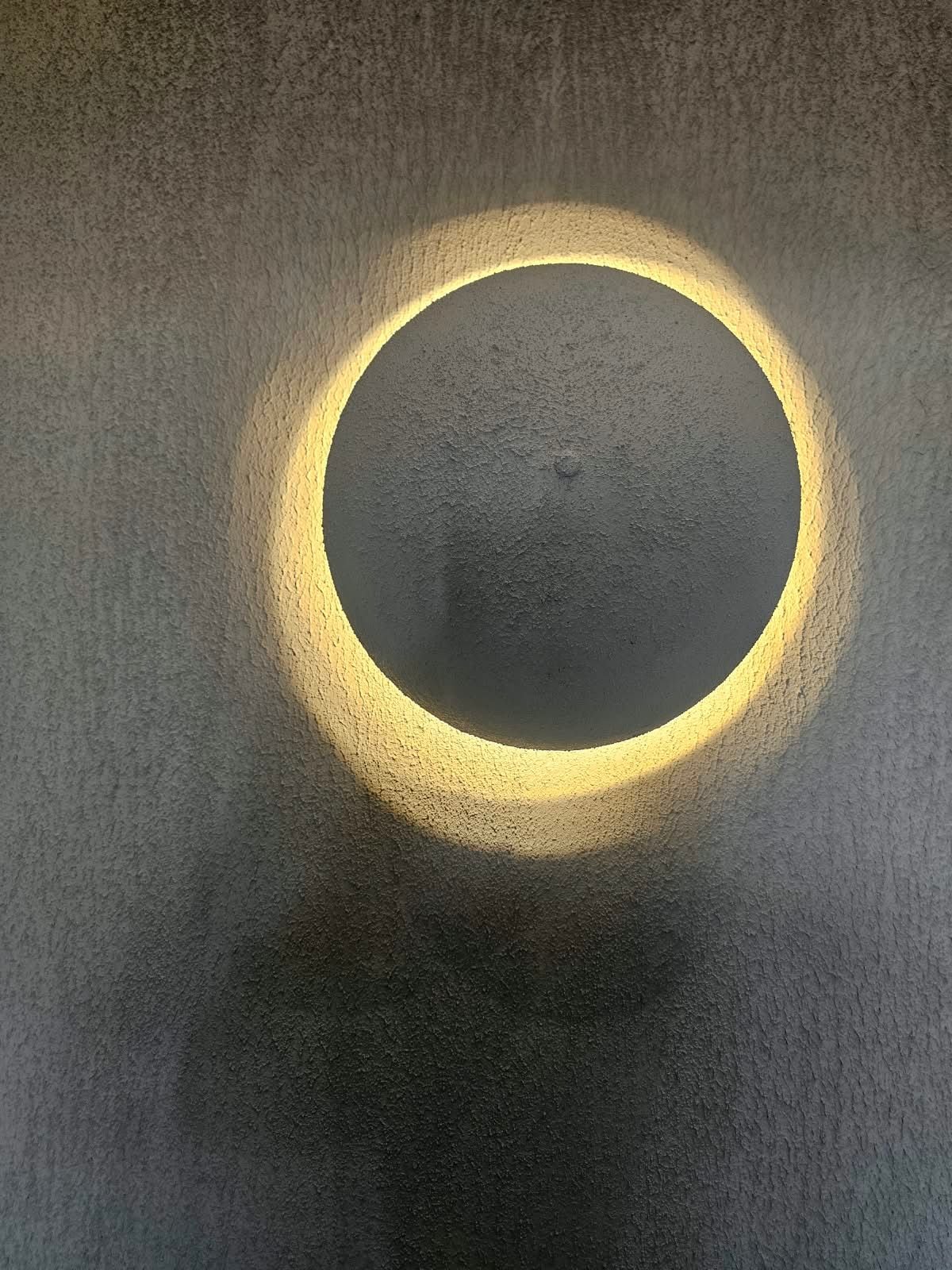 Eclipse wall light