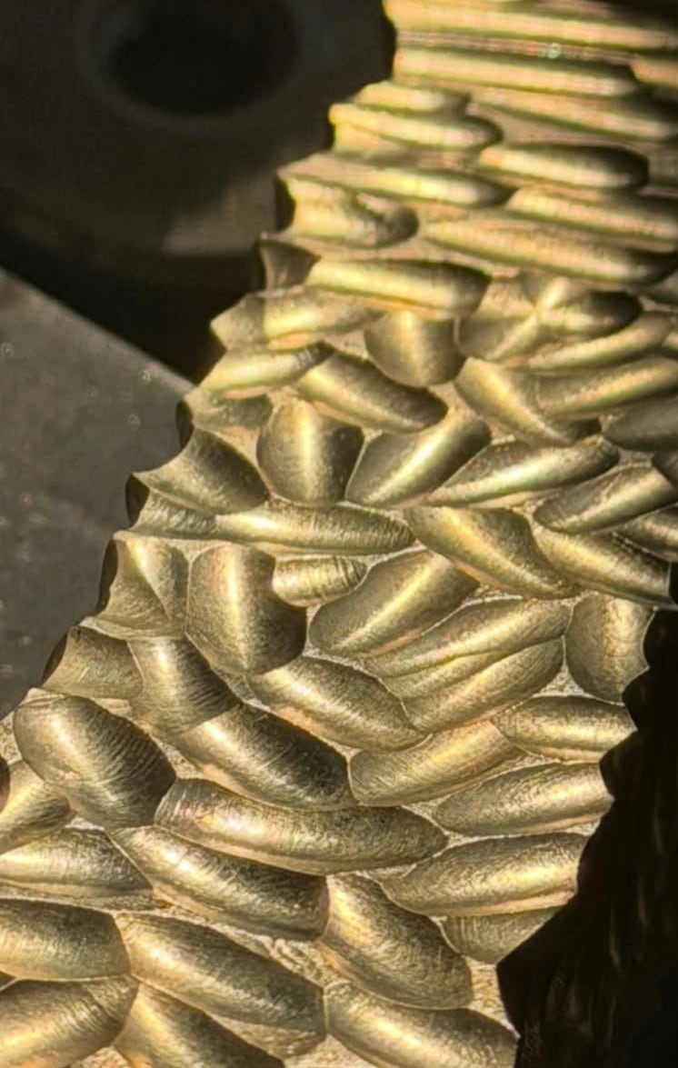 Sculpted brass relief