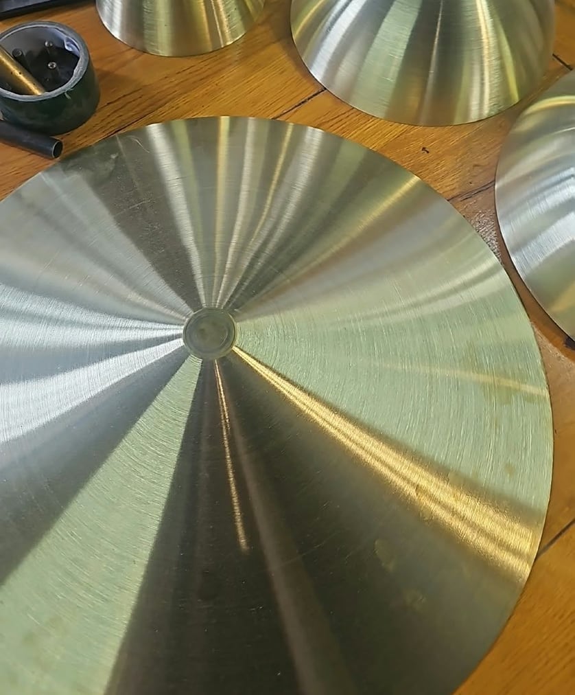 Spun brass