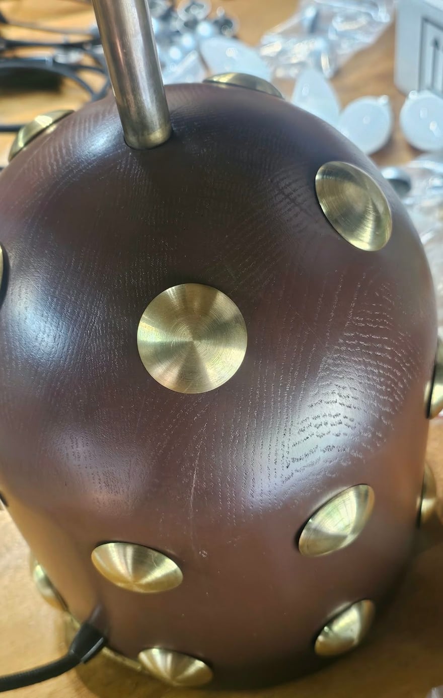 Studded timber lamp
